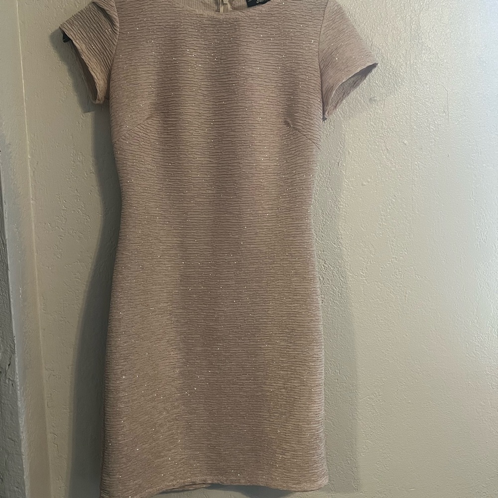 Cream dress, it’s super cute with glitter and it can be used for a elegant date!